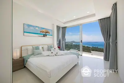 Luxurious bedroom with stunning ocean view and modern decor