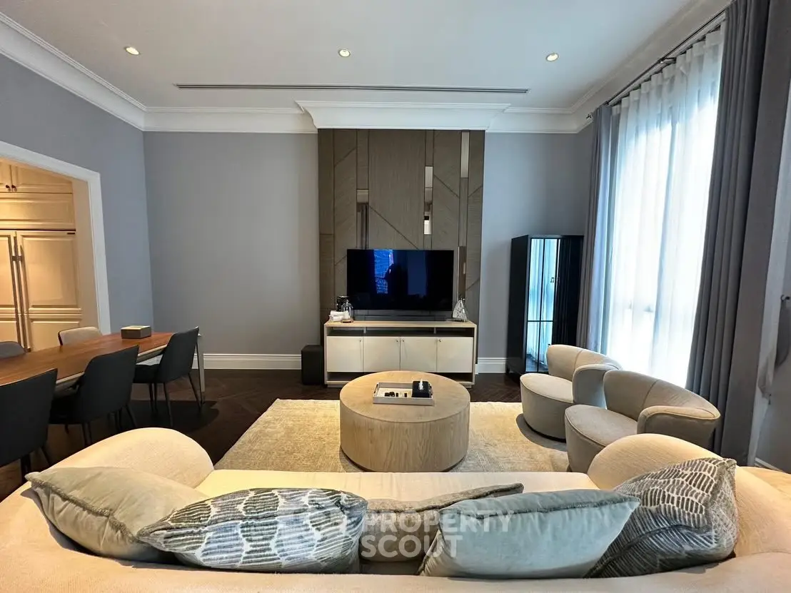 Luxurious living room with modern furniture and elegant decor, perfect for relaxation and entertainment.