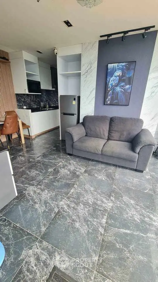 Modern living room with sleek marble flooring and stylish furniture