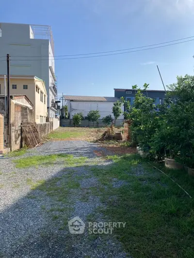 Spacious vacant lot with potential for development in a serene neighborhood.