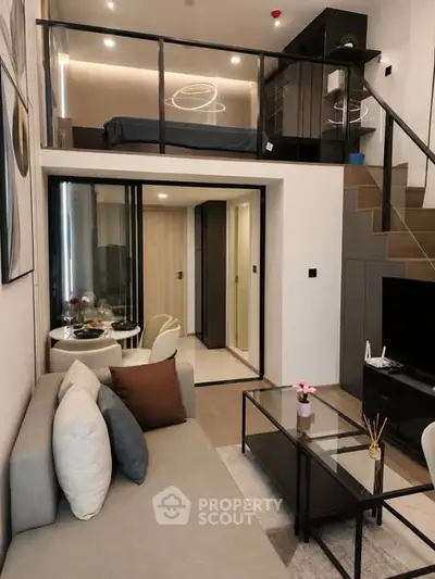 Modern loft apartment with stylish living room and mezzanine bedroom