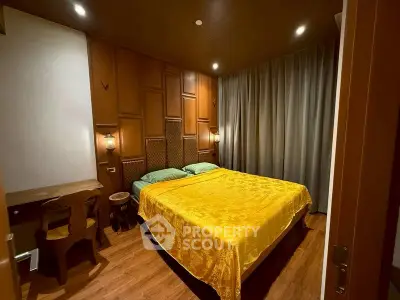 Luxurious bedroom with elegant wood paneling and ambient lighting
