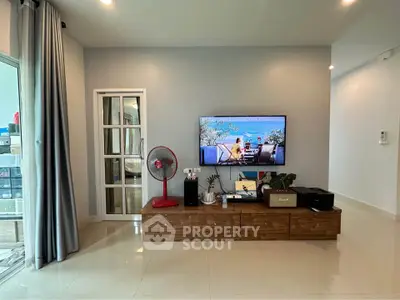 Modern living room with sleek TV setup and stylish decor
