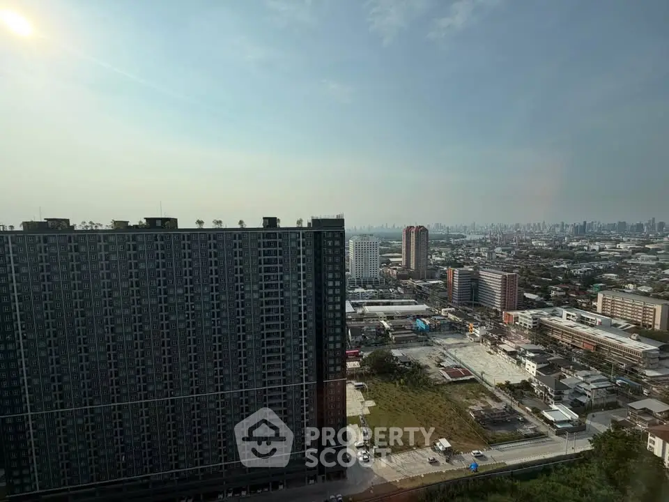 Stunning cityscape view from high-rise building, showcasing urban skyline and modern architecture.