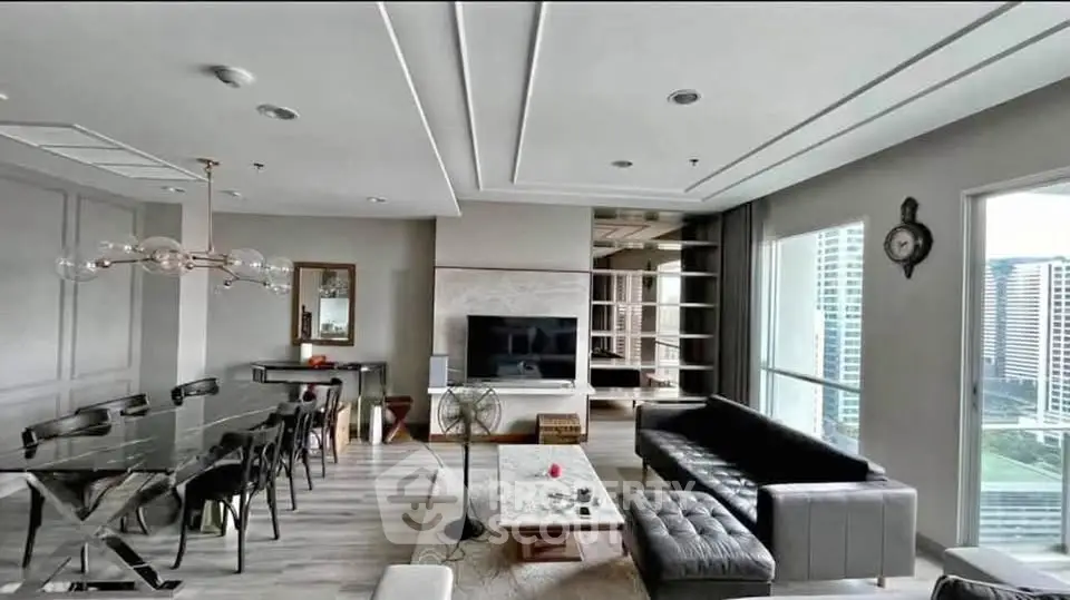Spacious modern living room with elegant dining area and city view