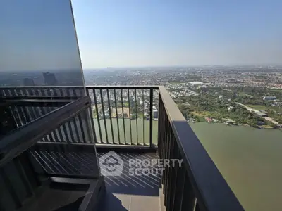 Stunning high-rise balcony with panoramic city and river views