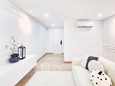 Bright and modern living room with elegant decor and air conditioning