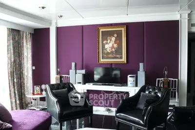 Luxurious living room with elegant decor and modern entertainment setup