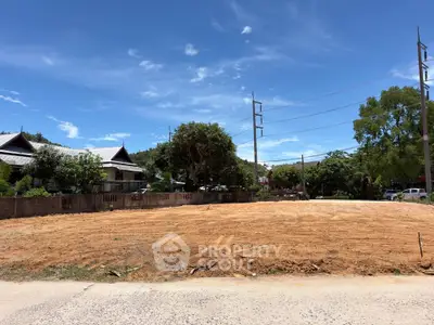 Prime vacant land for sale with clear skies and lush surroundings, perfect for development opportunities.