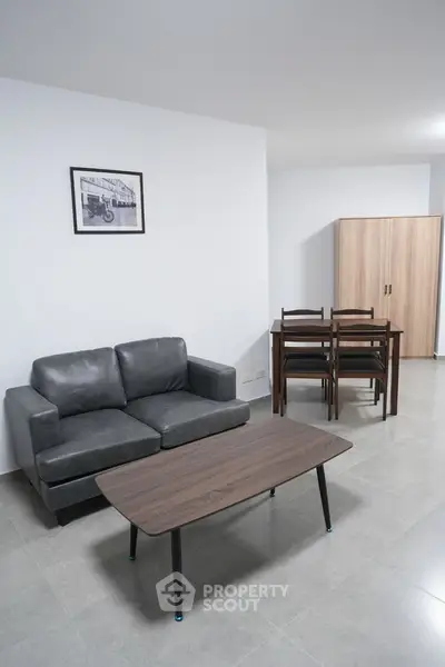 Modern living room with sleek furniture and minimalist design