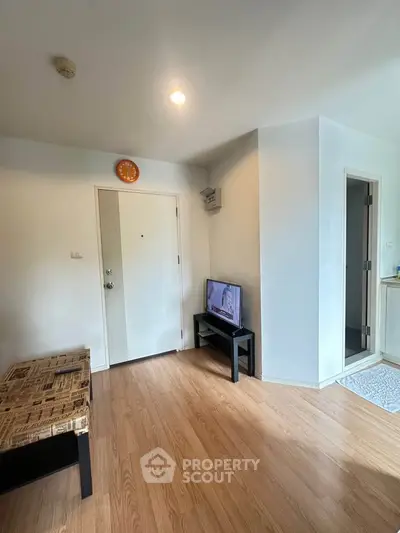 Cozy living room with wooden flooring and modern decor