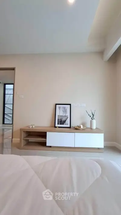 Modern bedroom with minimalist decor and stylish furniture