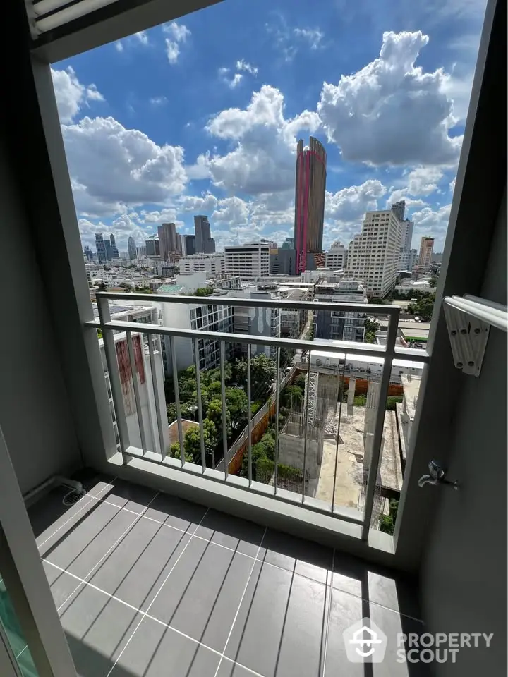 Stunning city view from modern balcony with vibrant skyline