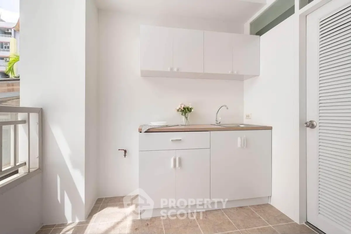 Bright and modern kitchen with sleek cabinetry and natural light