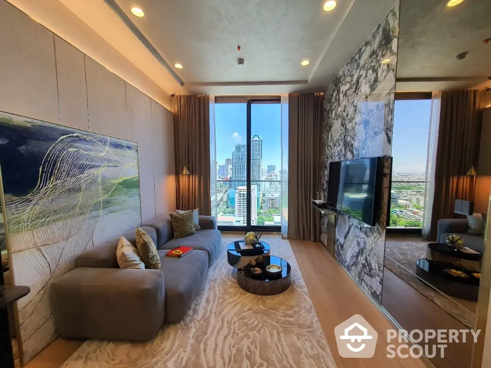 Luxurious living room with stunning city view, modern decor, and elegant furnishings in high-rise apartment.