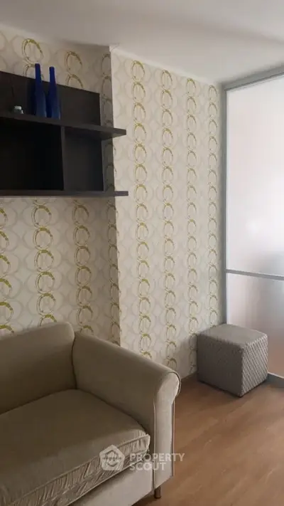 Cozy living room with stylish wallpaper and modern decor