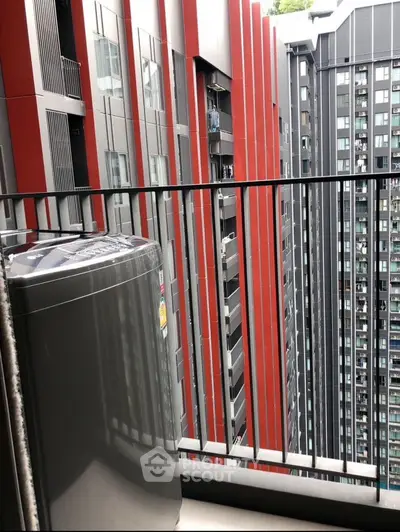 Modern high-rise apartment balcony with city view