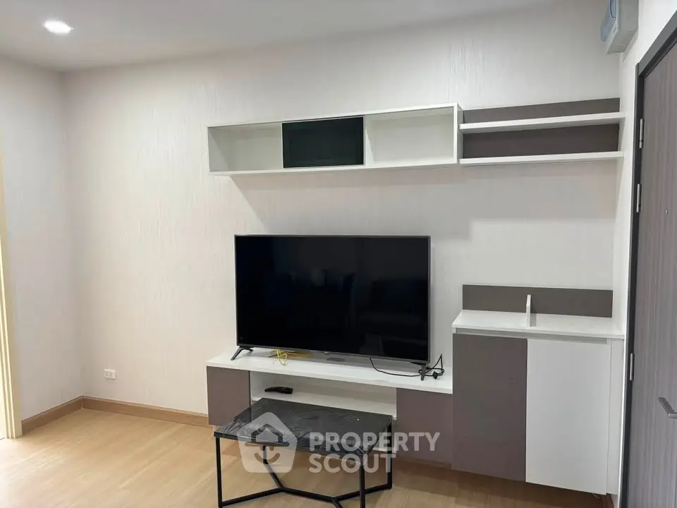 Modern living room with sleek TV unit and minimalist design