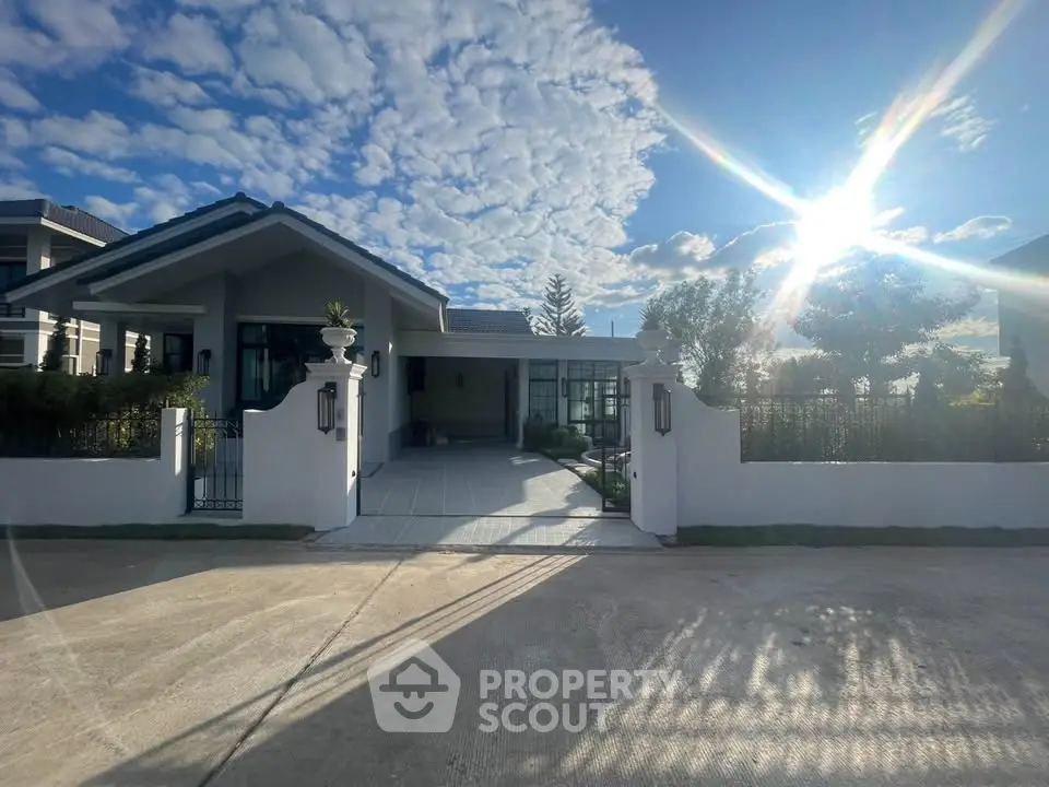 Stunning modern house with spacious driveway and beautiful sky view