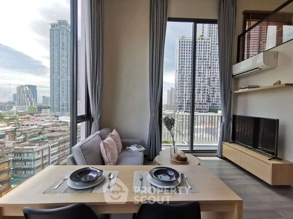 Modern living room with city view and balcony in high-rise apartment