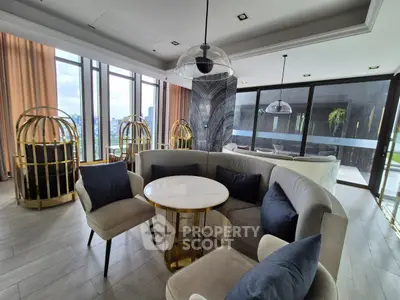 Luxurious modern living room with panoramic city views and elegant furnishings
