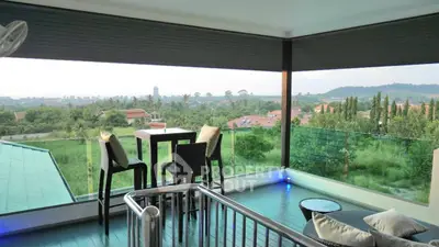 Stunning balcony with panoramic views and modern outdoor seating, perfect for relaxation and entertaining.