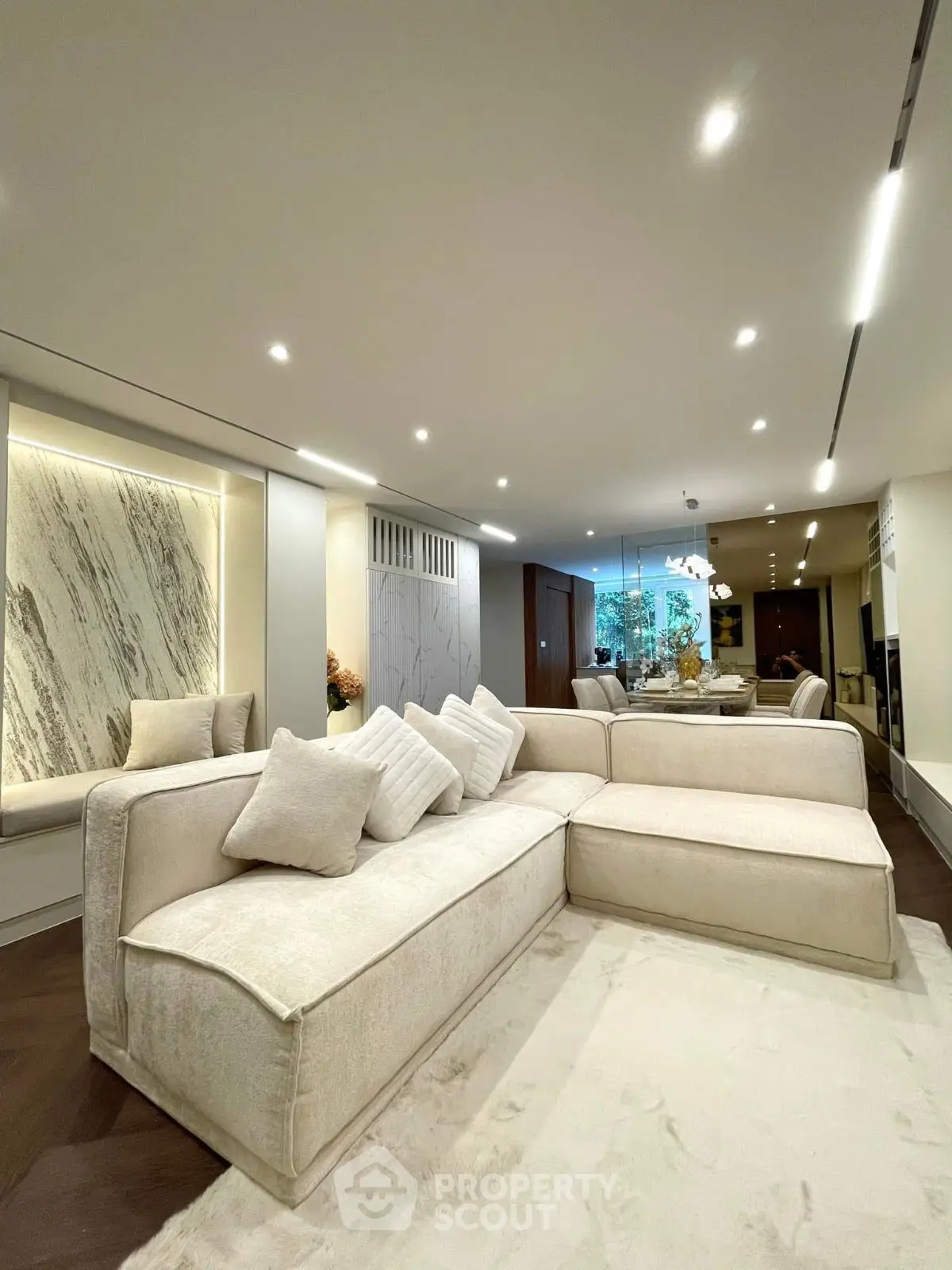 Luxurious modern living room with elegant beige sofa and stylish decor