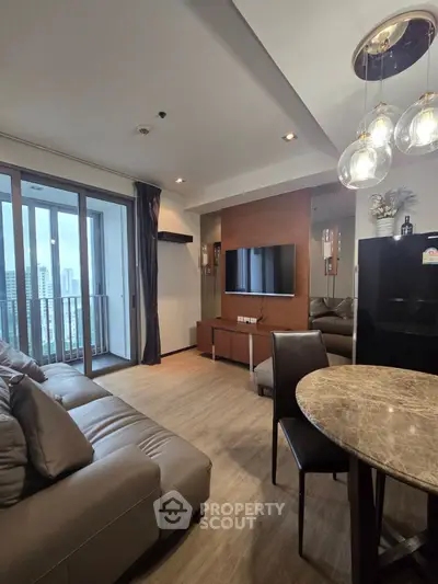 Modern living room with balcony view and stylish decor