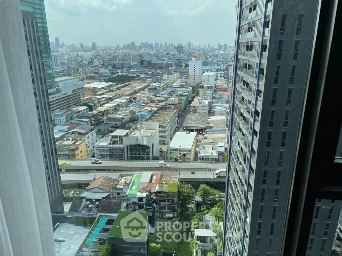 Stunning high-rise city view from modern apartment window