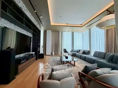 Luxurious modern living room with floor-to-ceiling windows and elegant decor