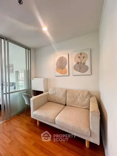 Cozy living room with modern decor and wooden flooring