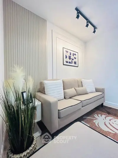 Cozy living room with modern decor and comfortable sofa