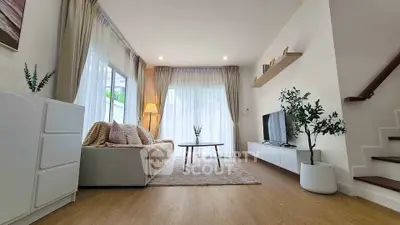 Modern living room with cozy decor and natural light