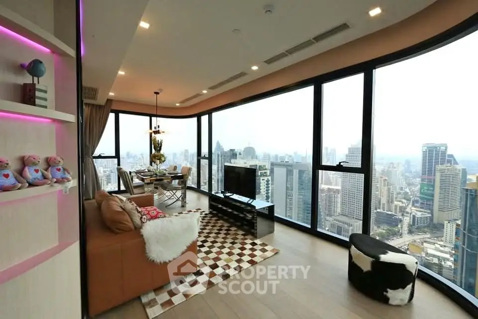 Luxurious high-rise living room with panoramic city views and modern decor