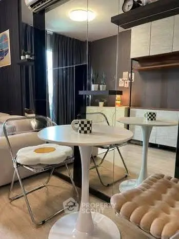 Cozy modern living room with stylish furniture and elegant decor, perfect for relaxation and entertaining.
