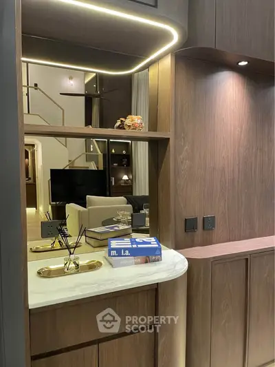 Luxurious modern living room with elegant wooden accents and ambient lighting