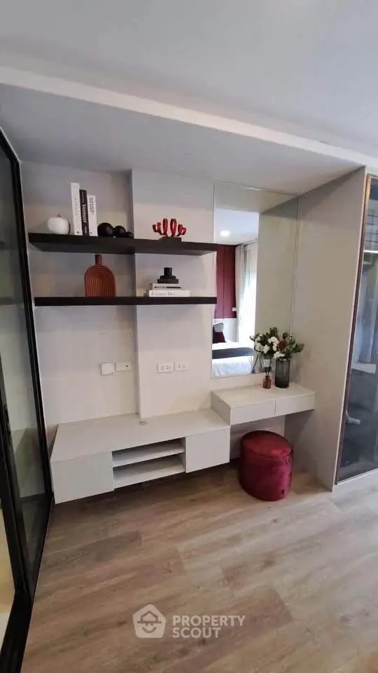 Modern living room with stylish shelving and cozy decor