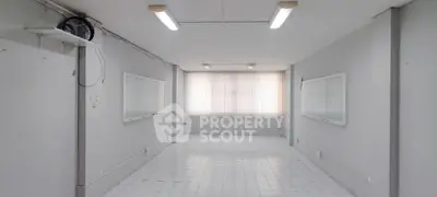 Spacious office space with bright lighting and large windows, ideal for business setup.