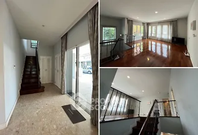 Spacious modern home with elegant staircase and bright living area, featuring hardwood floors and large windows.