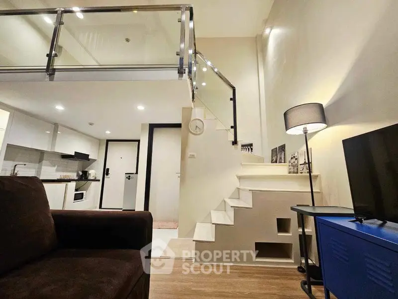Modern duplex apartment with stylish interior and open kitchen layout