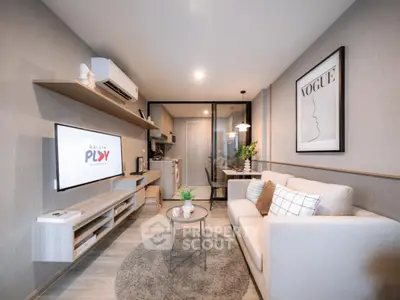 Modern living room with stylish decor and open kitchen layout