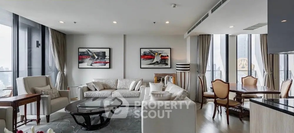 Luxurious modern living room with elegant furniture and stunning city view.