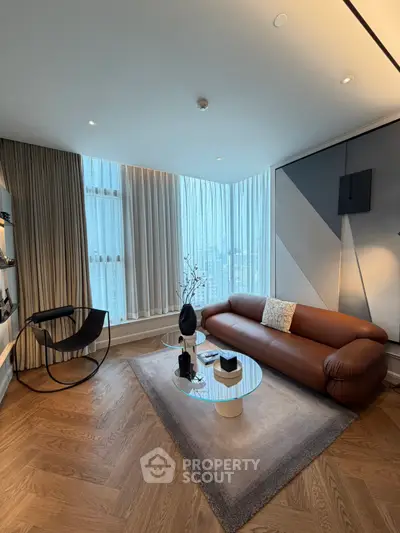 Luxurious modern living room with elegant decor and stunning city view.
