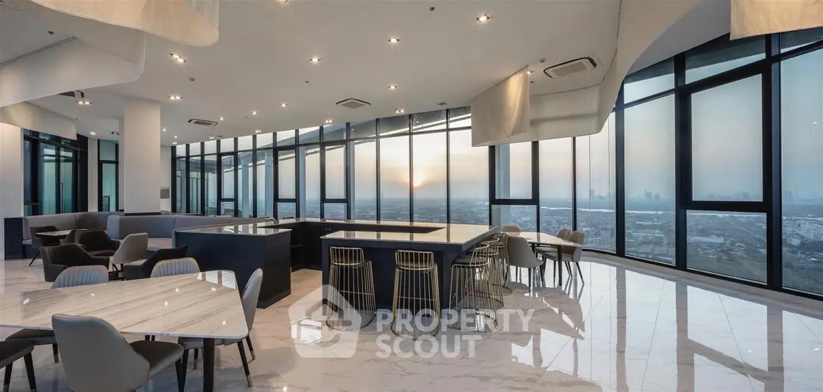 Luxurious penthouse with panoramic city views and modern open-plan design.