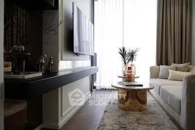 Elegant living room with modern decor and large window, featuring a cozy sofa and stylish coffee table.