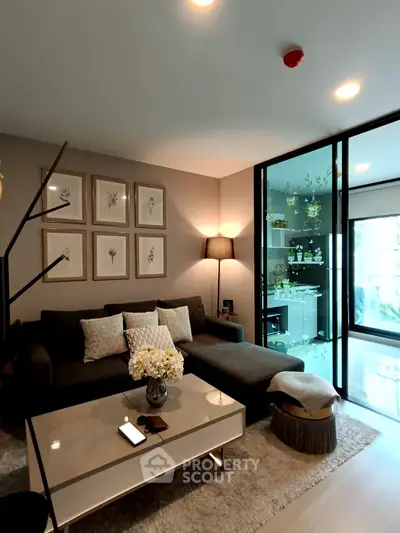 Modern living room with stylish decor and large glass windows