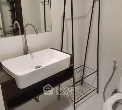 Modern bathroom with sleek sink and minimalist design