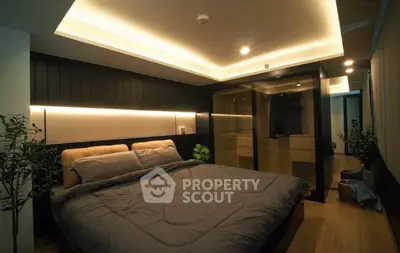Luxurious modern bedroom with ambient lighting and elegant decor