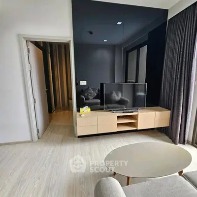 Modern living room with sleek TV setup and stylish decor