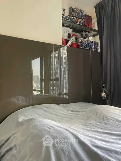 Modern bedroom with city view and stylish decor